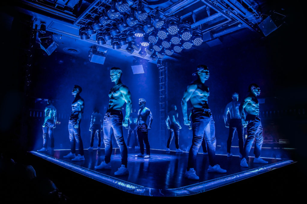 Magic Mike Dancers in blue light