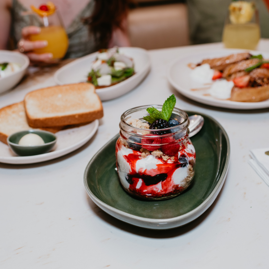 Brunch food at Zeffer's Cafe. Strawberry parfait, toast, french toast