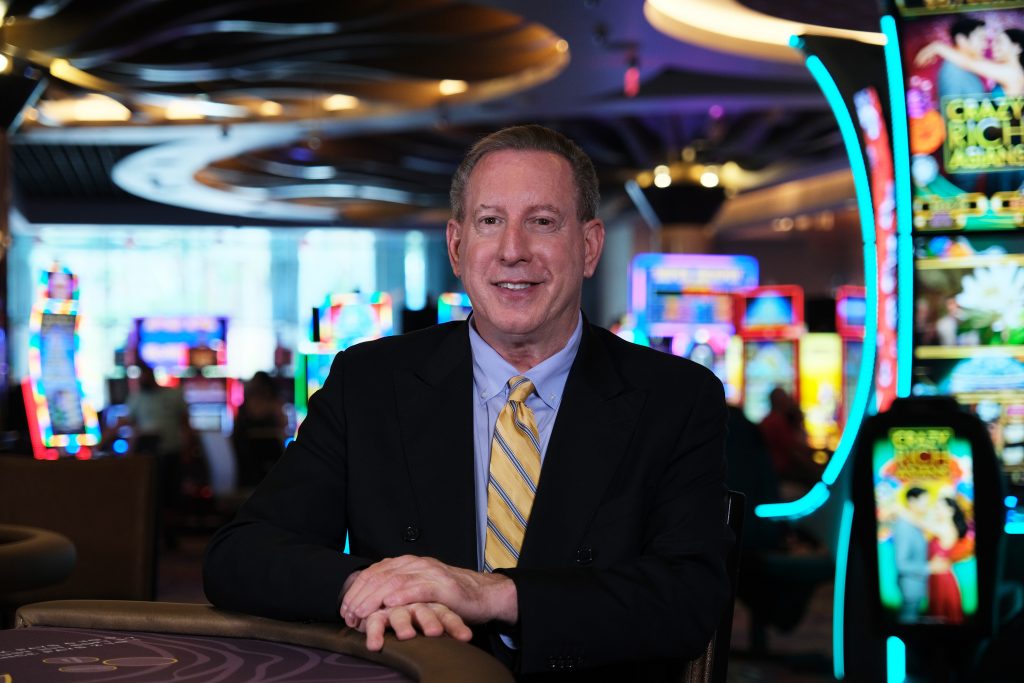 Curt Kouser - executive casino host posing for a photo