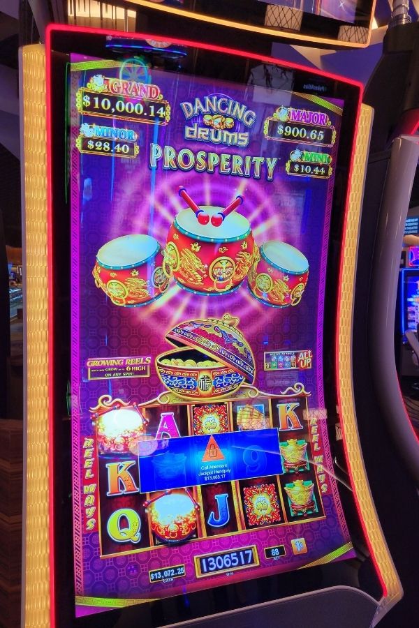 Slot machine showing a huge jackpot win of over $13,000