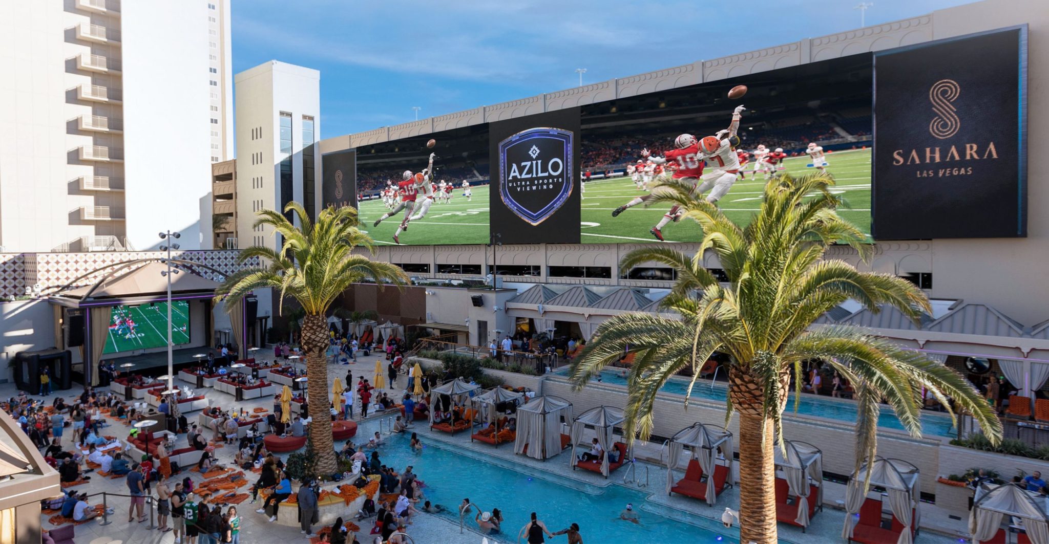 AZILO las Vegas showing pro football on the main screens. Shows the pool space full of people.