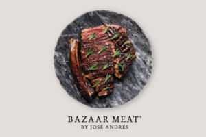Visual of a ribeye on a stone plate for Bazaar Meat