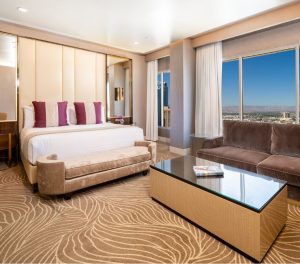 Marra Style suite showing a bed with a view of vegas